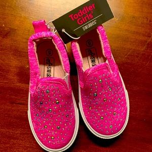Super cute pink slip ons.